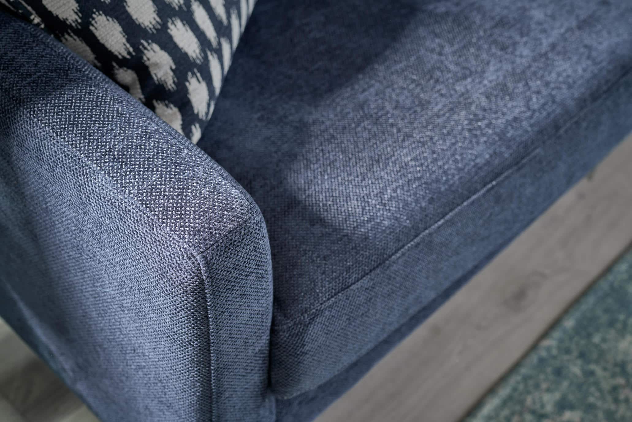 Seaton blue upholstery, arm and seat cushion detail