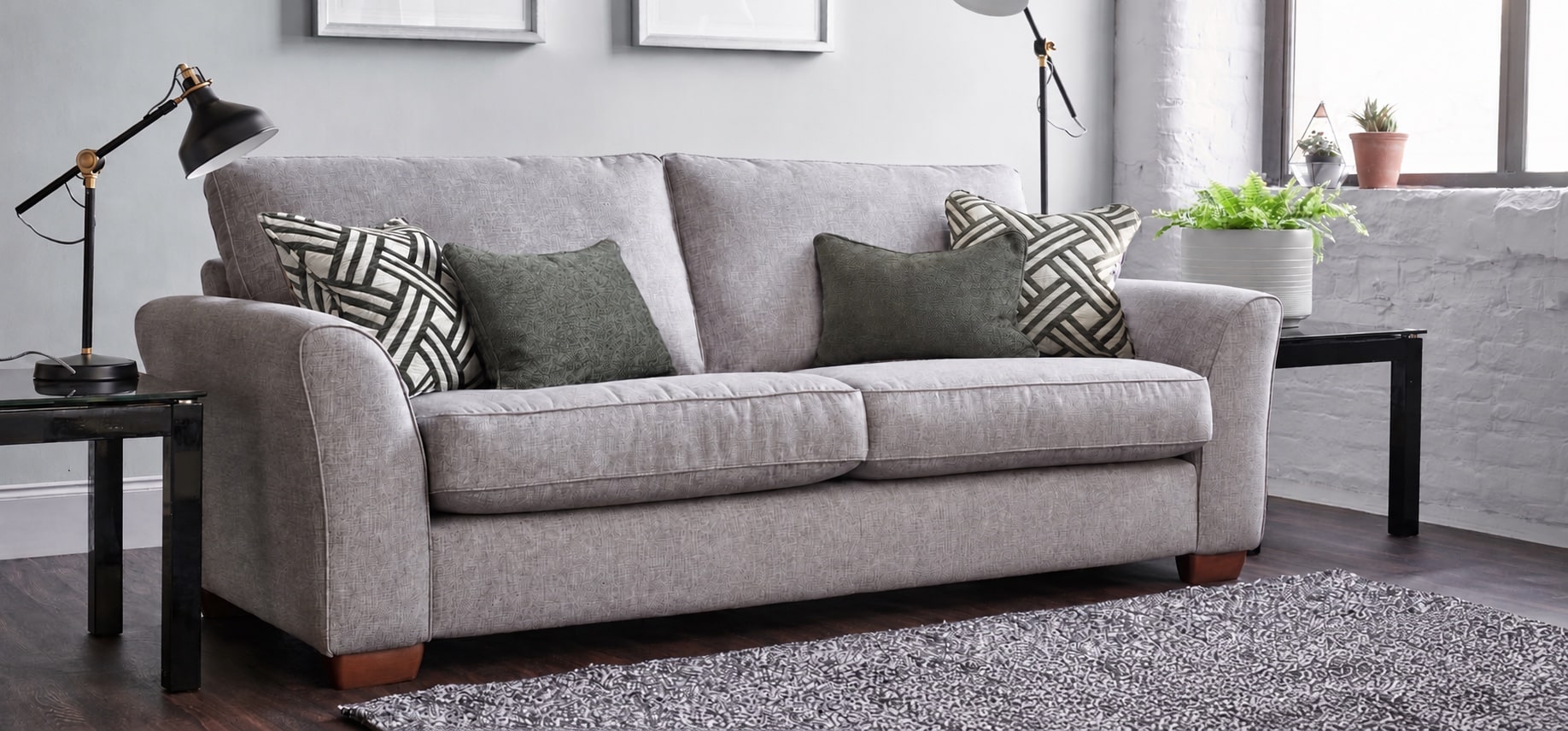 Oddicum sofa with geometric and green cushions